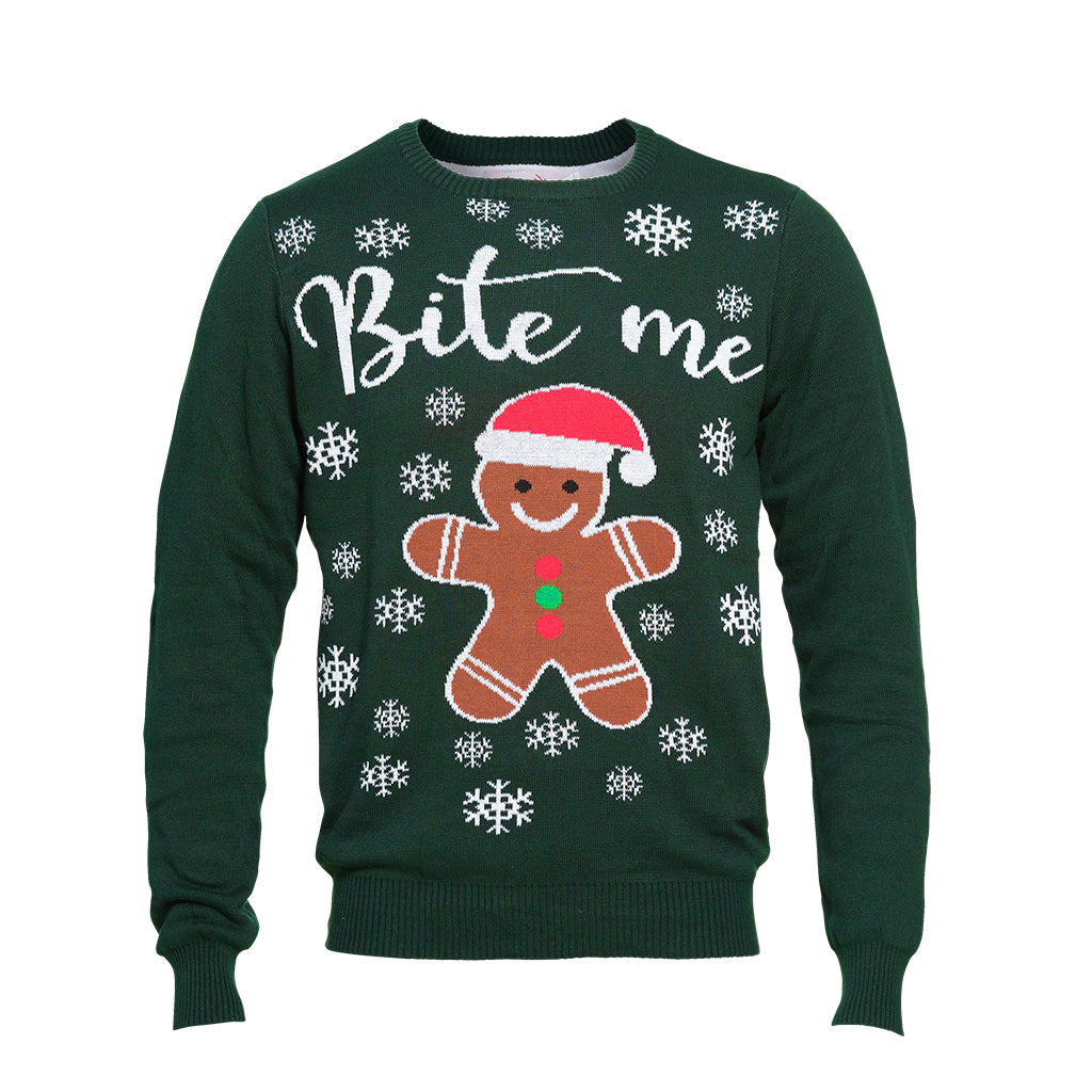 En grøn julesweater med en kagemand og citatet 